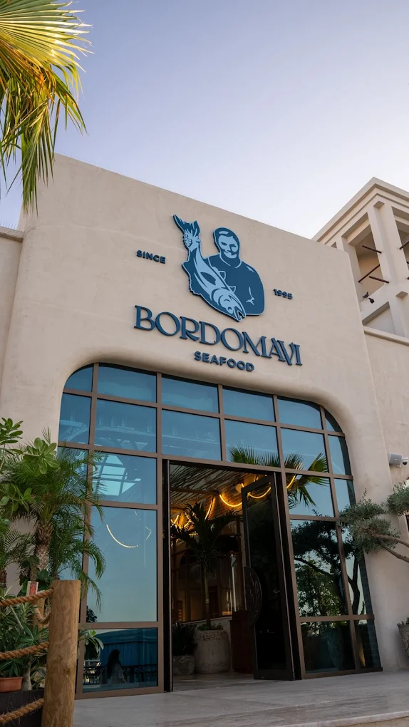 "Professionals collaborating at a Dubai fit-out project site, 2023-11-20"